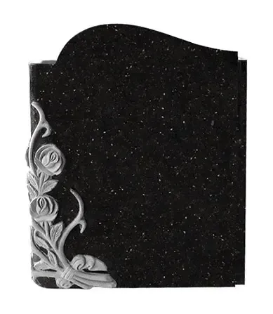 Black plaque with glittery surface and ornate silver floral design along the left edge and bottom.