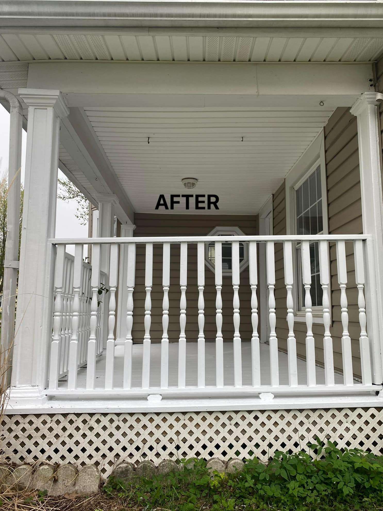 A porch with a white railing and a sign that says `` after ''.