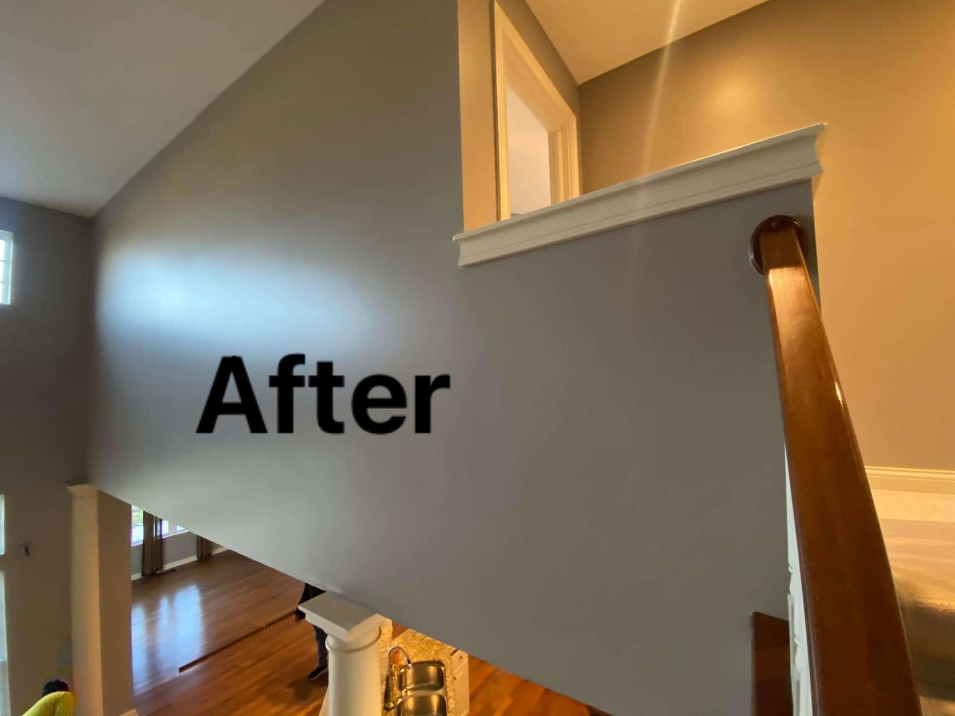 A picture of a staircase after being painted.