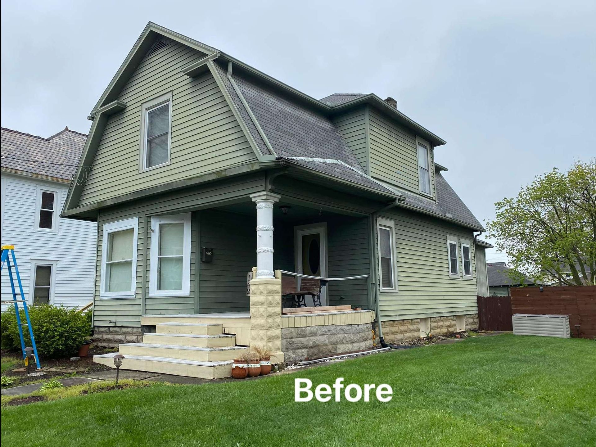 A picture of a house before being painted green.