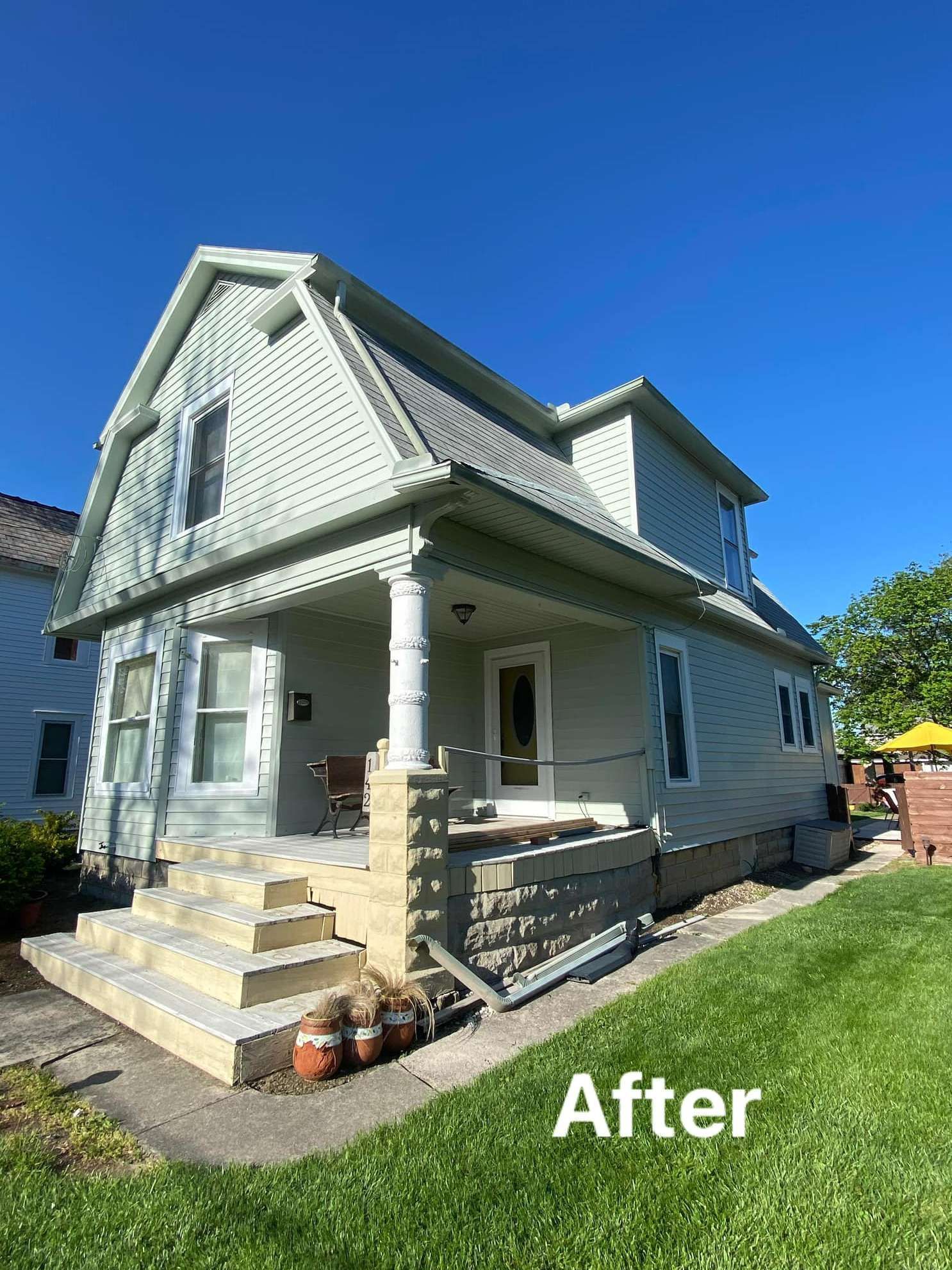 A picture of a house after being painted.