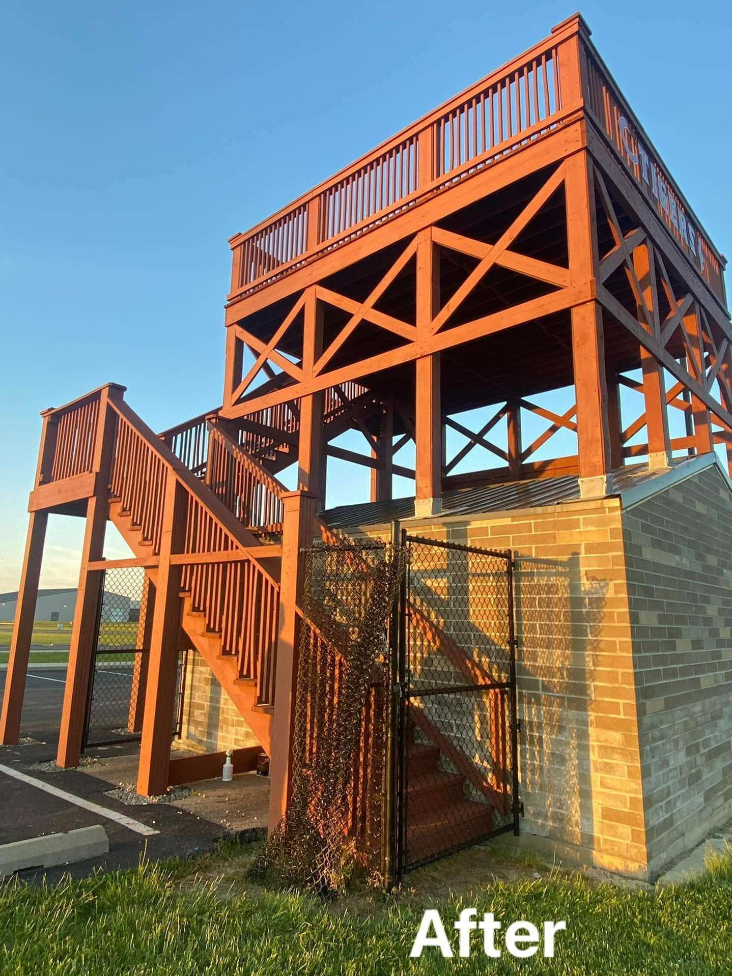 A picture of a wooden structure with stairs and a caption that says after