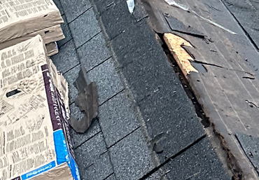 Storm Damage — Damaged Roof in Syracuse, IN Storm Damage — Damaged Roof in Syracuse, IN