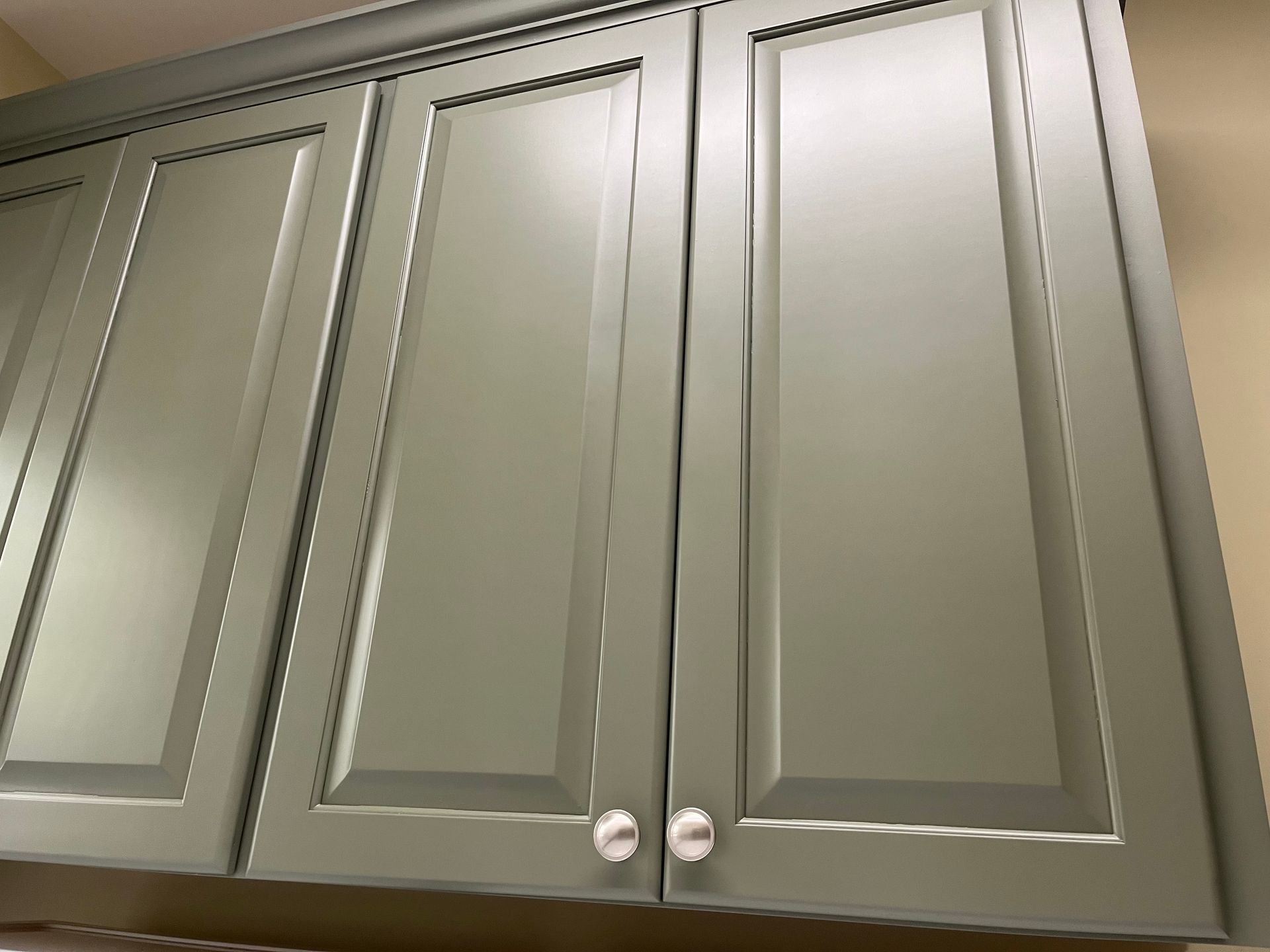 A close up of a cabinet with two doors