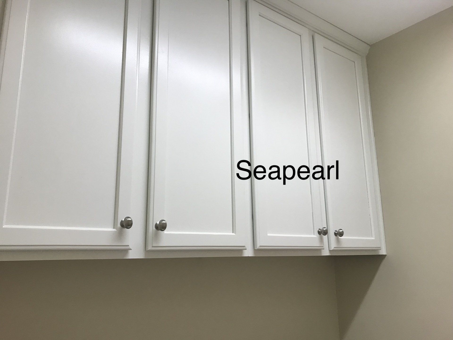 A white cabinet with the word seapearl on it