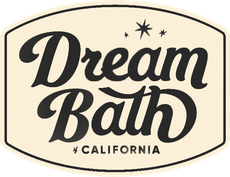 Dream Bath California logo in black script on a cream background with stars.