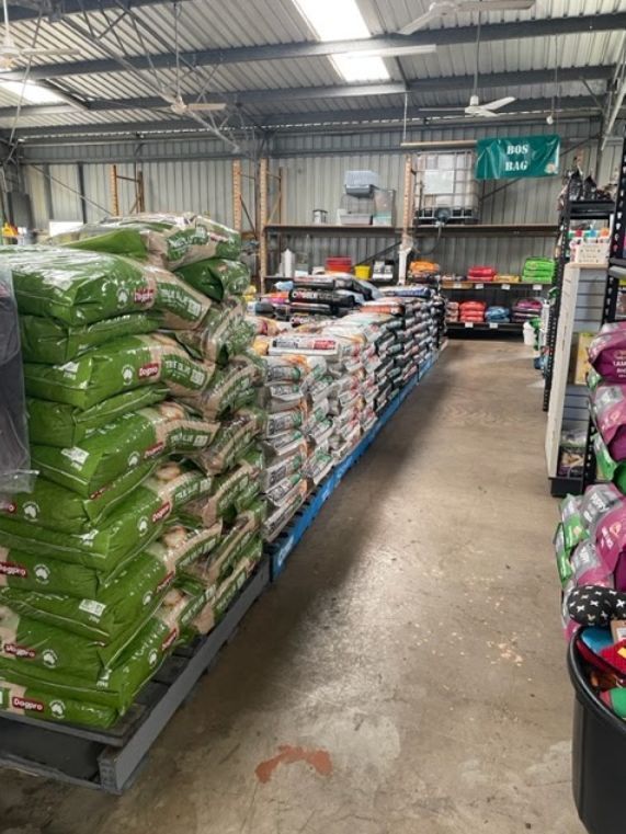 A Warehouse Filled with Lots of Bags of Food — Yeppoon Stockfeed & Rural Supplies in Yeppoon, QLD