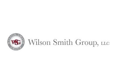 Wilson Smith Group, LLC logo: gray circular emblem with
