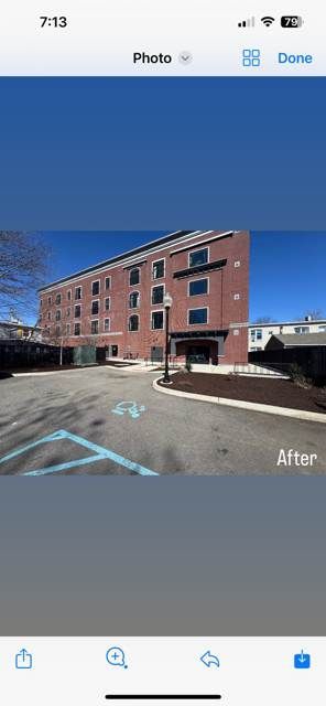 A phone screen shows a picture of a building before and after being painted.