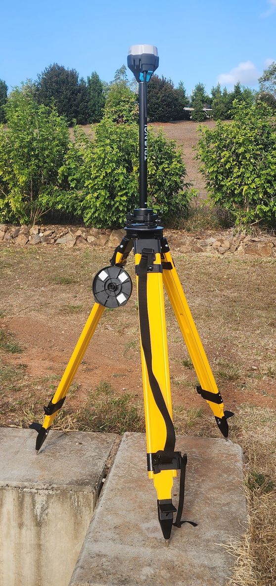 Surveying Equipment on a Yellow Tripod in a Field — Found It Down Under in Glenwood, QLD