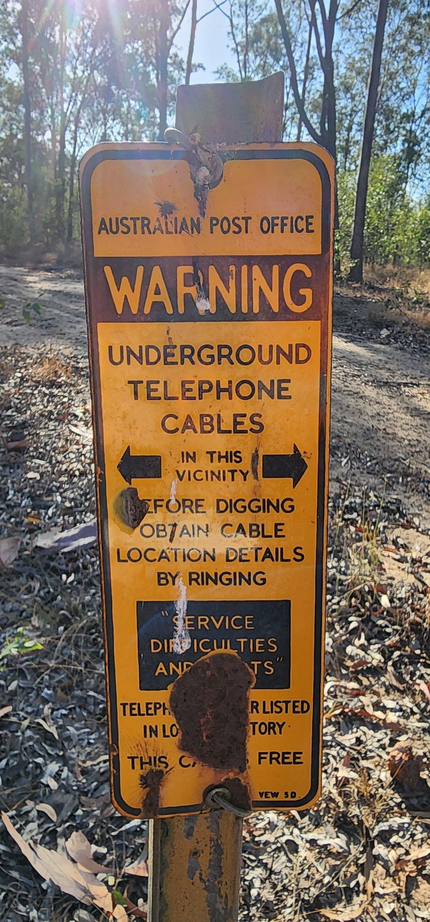 Yellow Warning Sign for Underground Telephone Cables — Found It Down Under in Glenwood, QLD