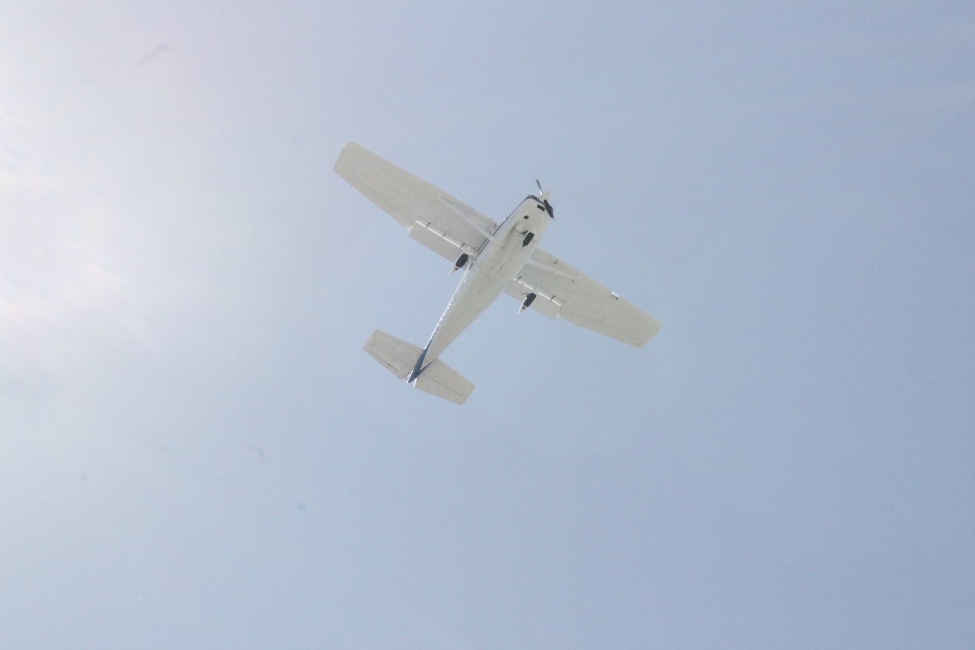 Photo by Coral Grandbois: https://www.pexels.com/photo/white-cessna-plane-flying-under-blue-sky-8379515/