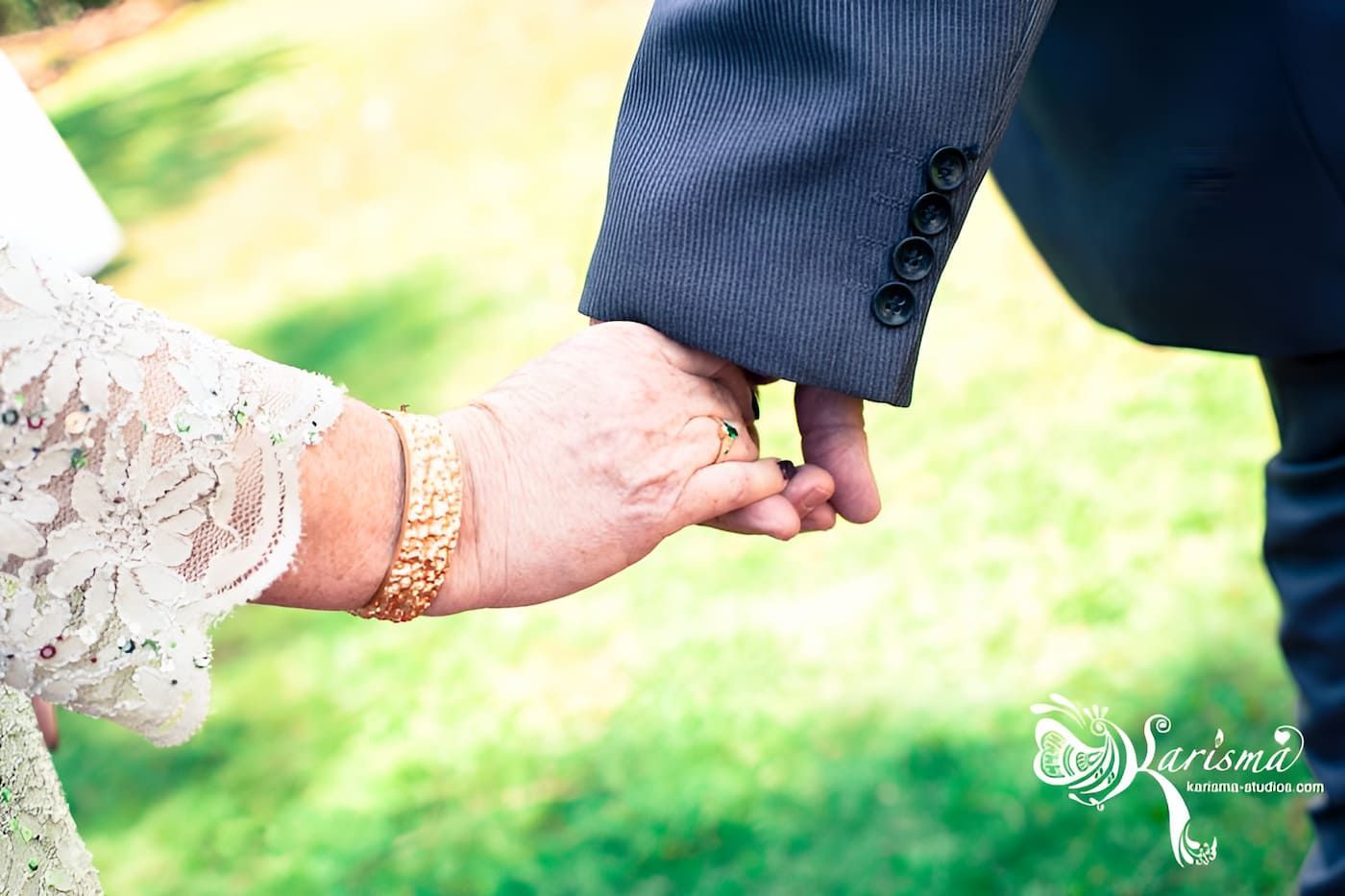 Elderly Couple Just Showing Hands Holding — Lynda Ross Marriage Celebrant In Alice River, QLD