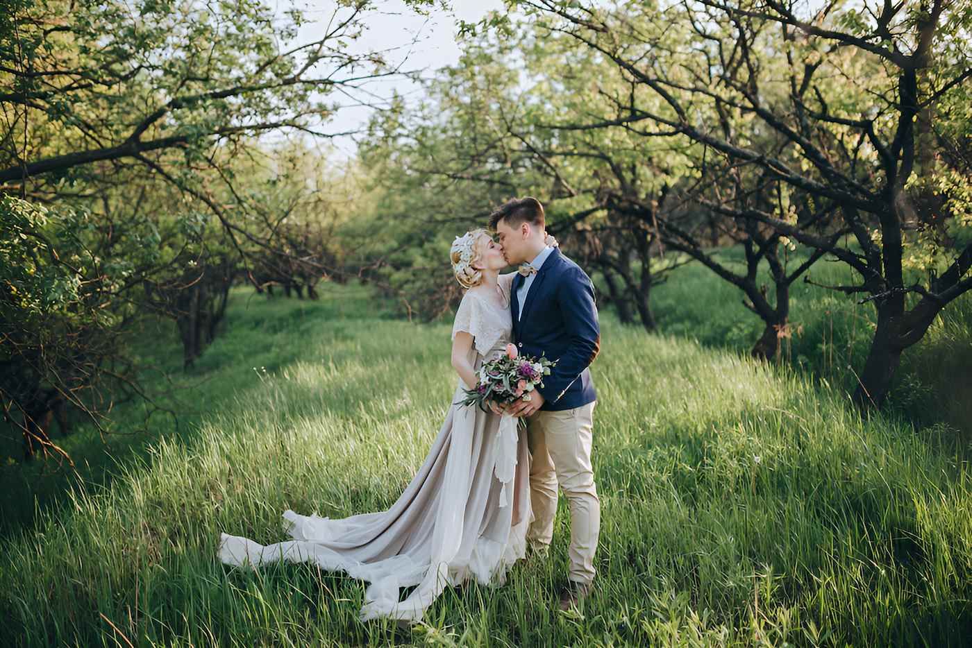 A Bride and Groom Kissing — Lynda Ross Marriage Celebrant In Alice River, QLD