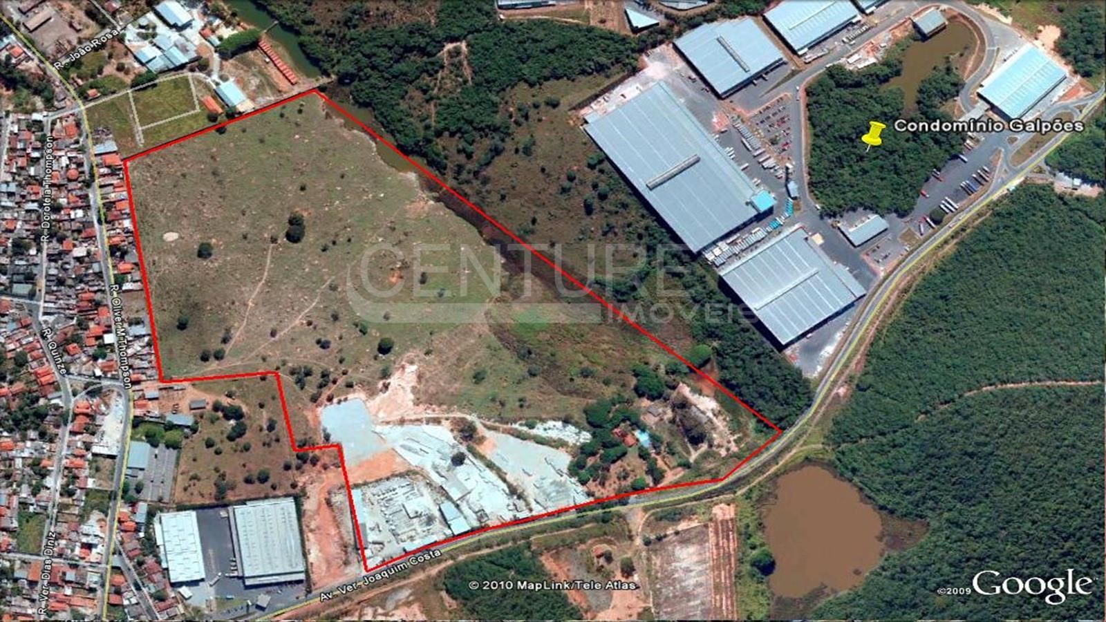 Uma vista aérea de uma grande área industrial com muitos edifícios.