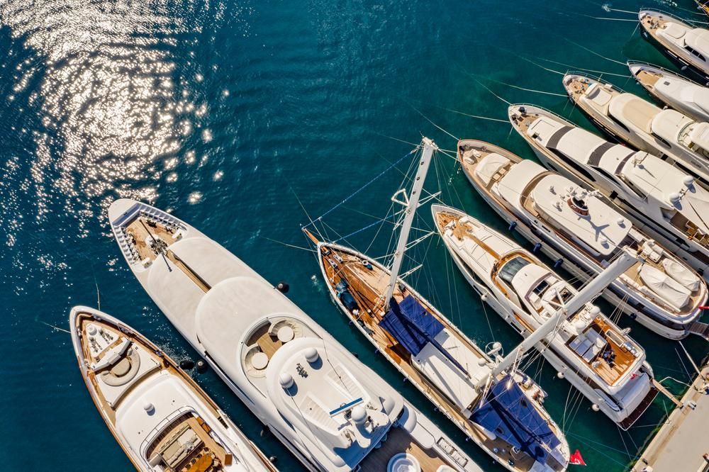 A Group Of Boats Are Docked In A Harbor — PASMA Electrical In Mareeba, QLD
