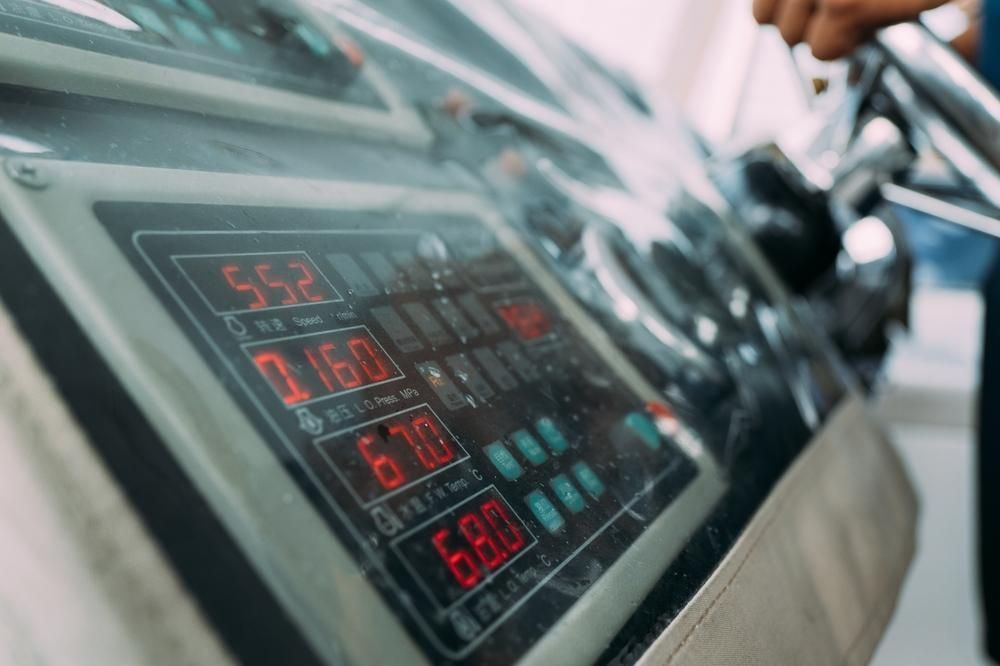 A Person Is Operating A Machine With A Digital Display — PASMA Electrical In Mareeba, QLD