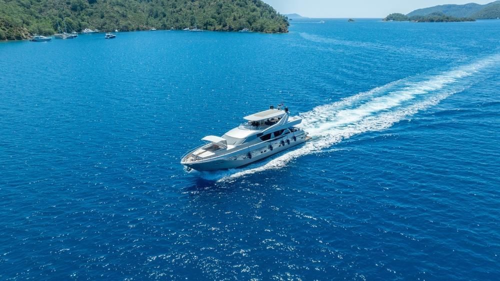 A Large Yacht Is Floating On Top Of A Large Body Of Water — PASMA Electrical In Portsmith, QLD