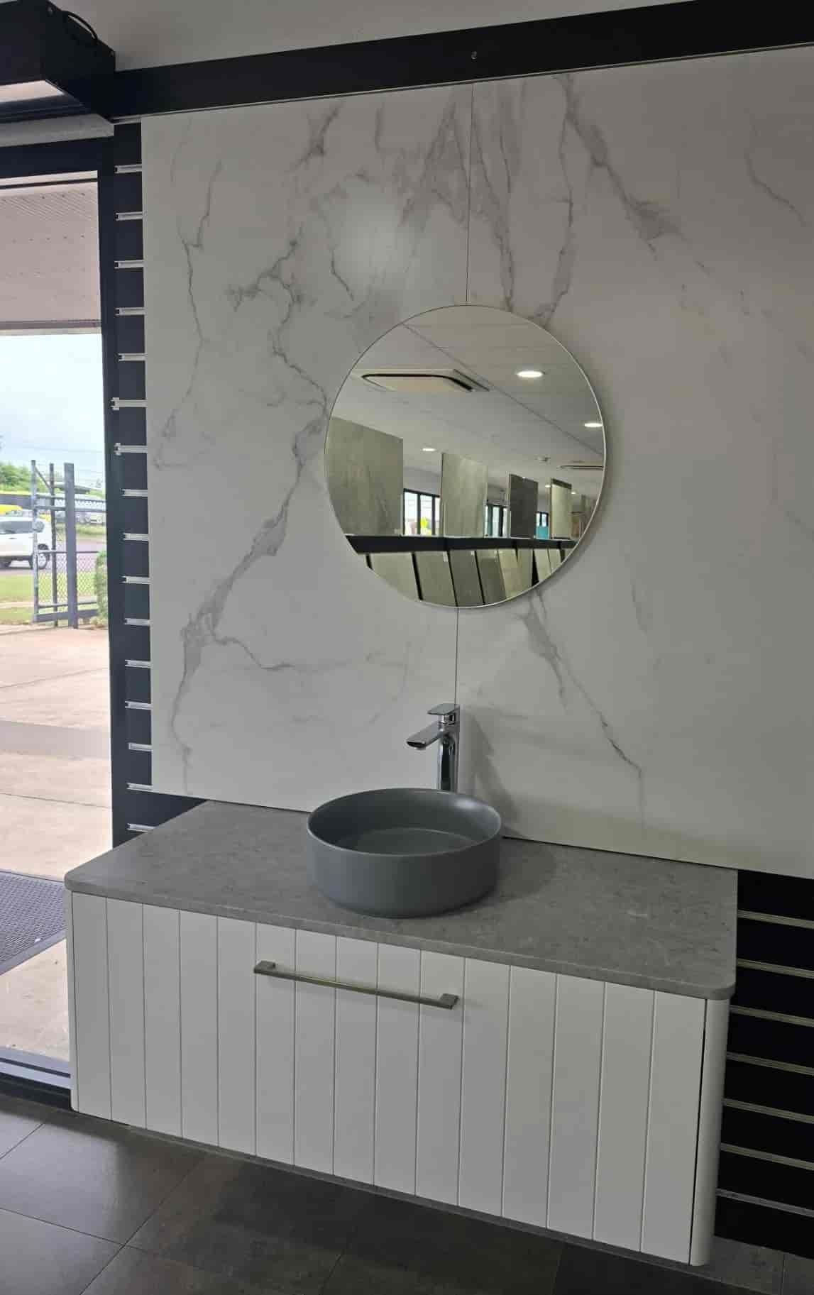A Bathroom With a Sink and a Mirror on the Wall — Northern Tile Gallery in Winnellie, NT