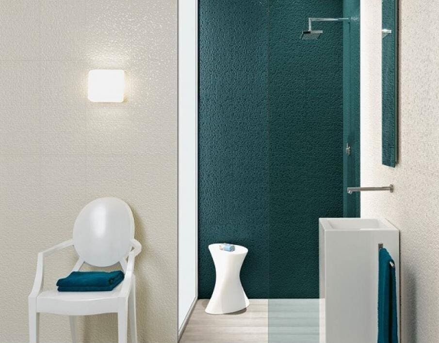 A Bathroom With a Chair a Sink and a Shower — Northern Tile Gallery in Winnellie, NT