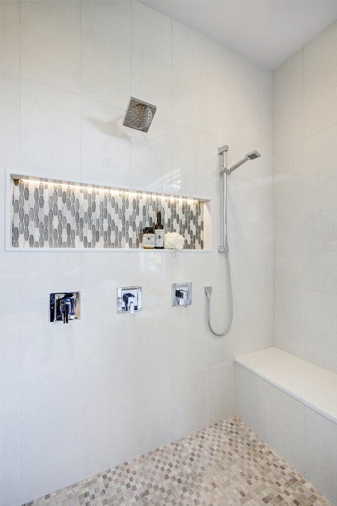 A Shower With a Bench and a Shower Head in a Bathroom — Northern Tile Gallery in Winnellie, NT
