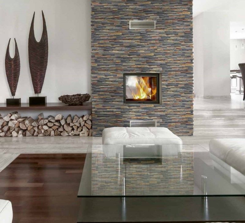 A Living Room With a Fireplace and a Glass Coffee Table — Northern Tile Gallery in Winnellie, NT