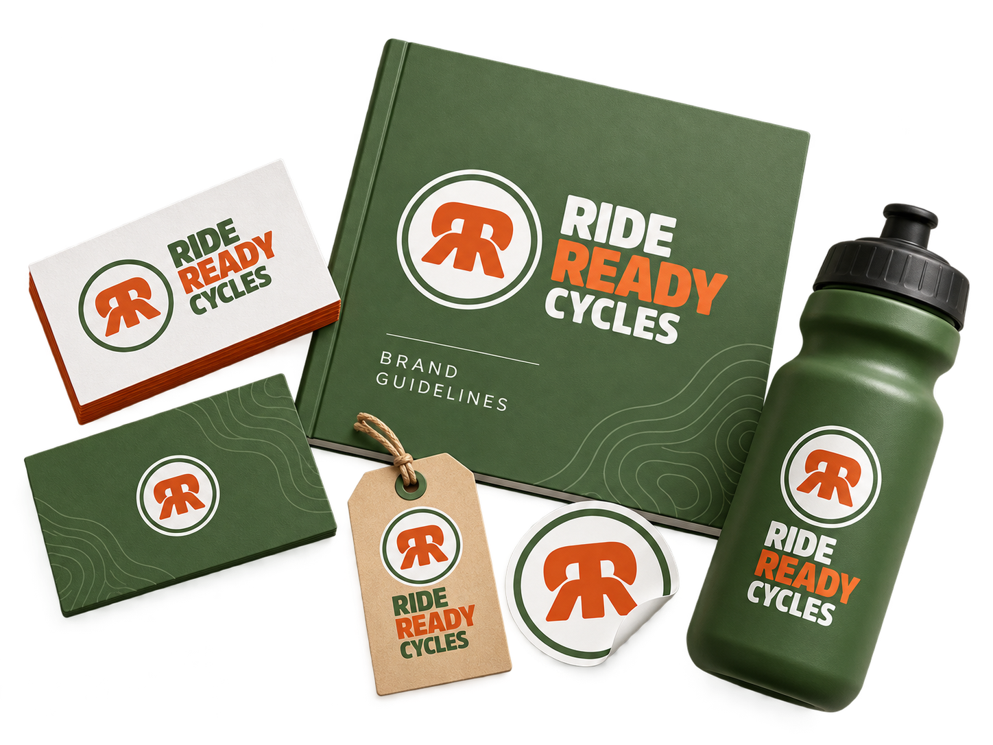 Ride Ready Cycles branded merchandise set in green, orange, and white: notebook, cards, stickers, and water bottle