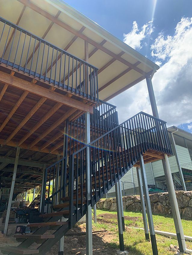 A house with stairs leading up to the second floor. — Simmweld Metal Fabrication and Welding In Banora Point, NSW