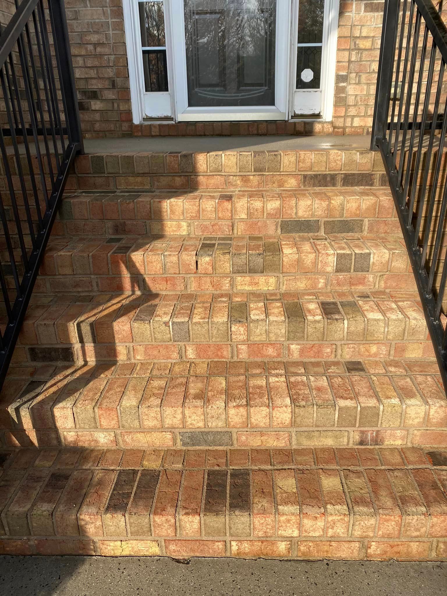 Brick steps restored with professional power washing services from a trusted power washing company