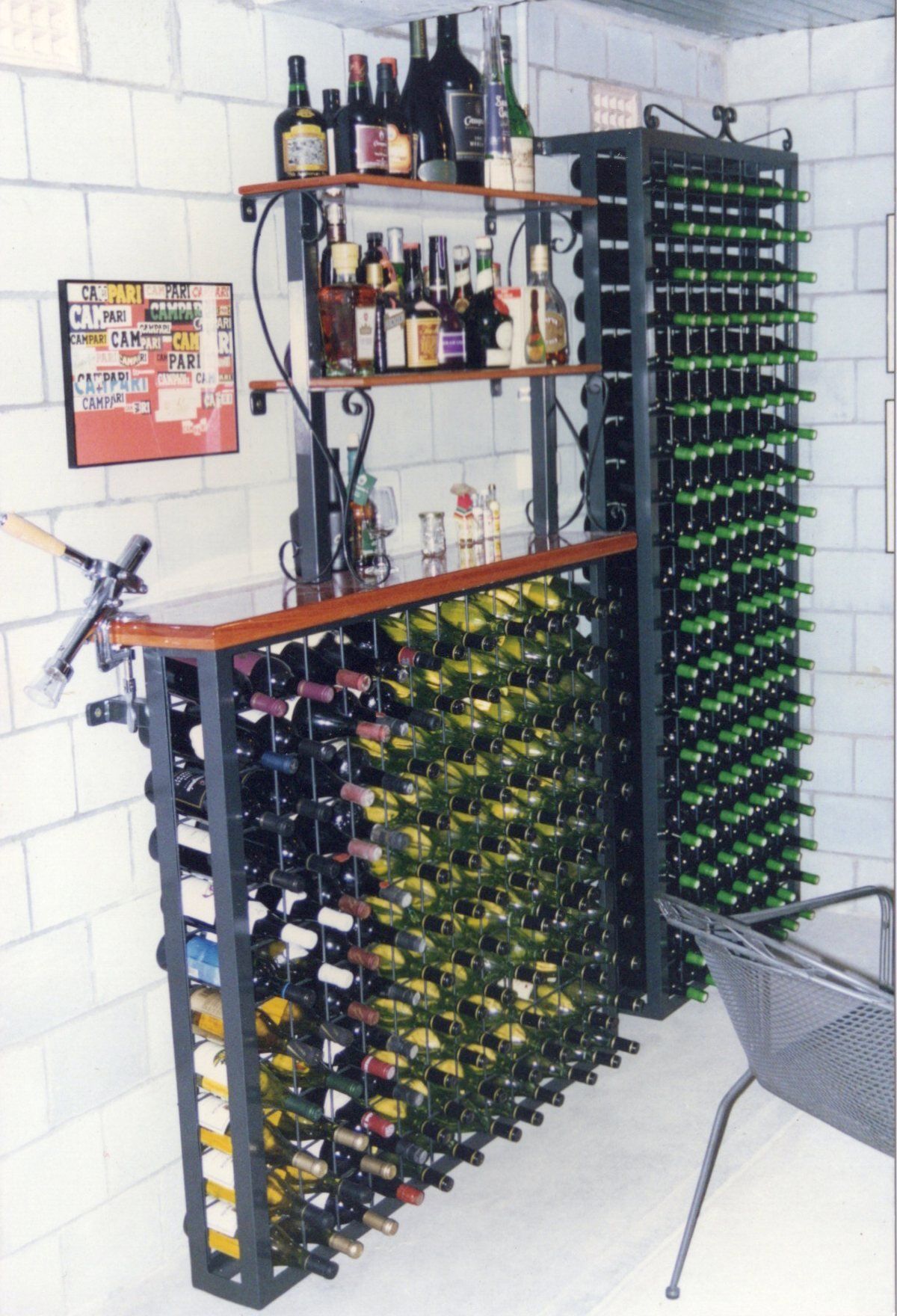 A wine rack with many bottles of wine on it