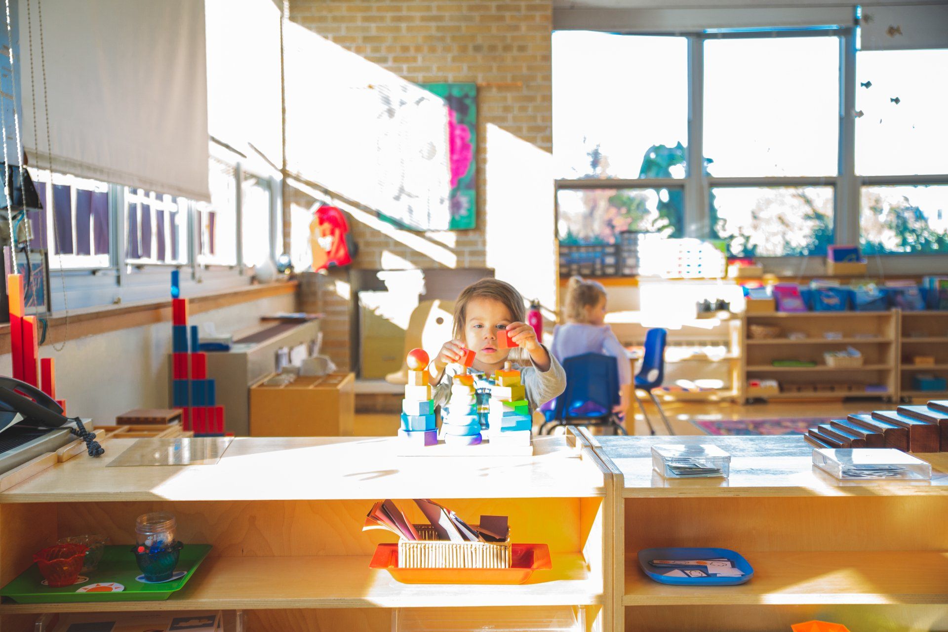 Montessori child working in the classroom