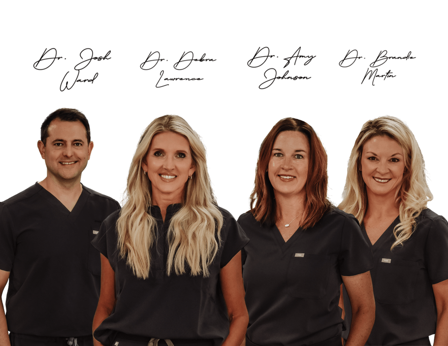Four people in black shirts standing in front of a white background with names written above them