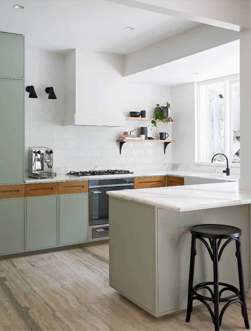 A Kitchen with Green Cabinets, White Counter Tops — Aqua Blue Plumbing Services in Coffs Harbour, NSW 