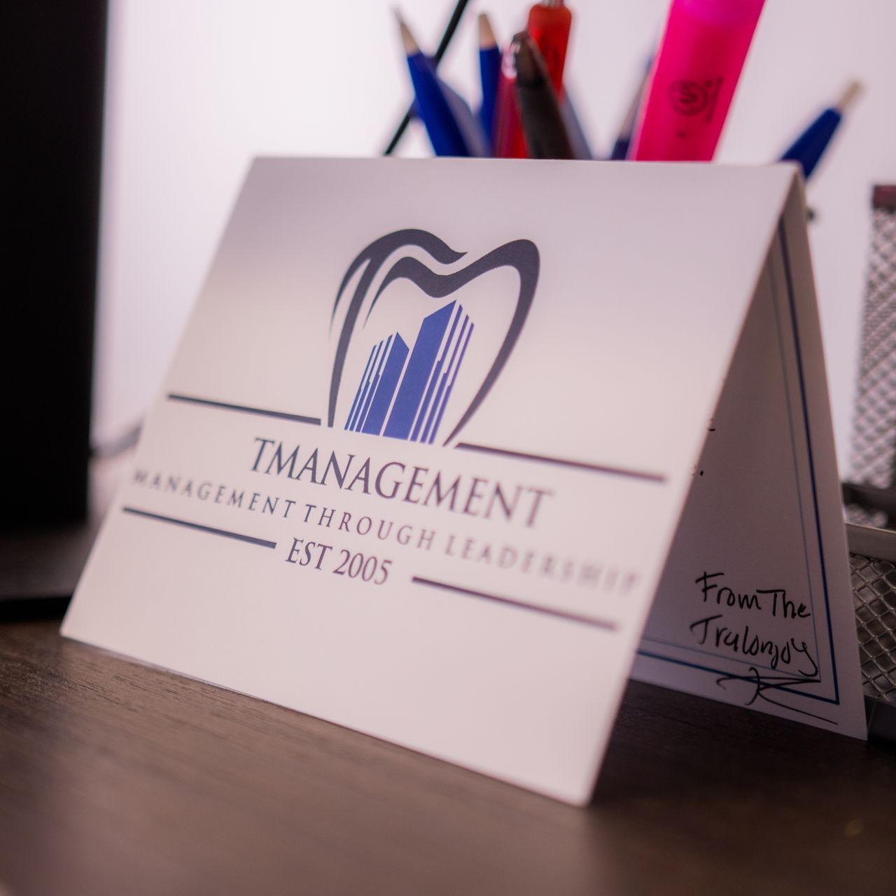 A business card for tmanagement management through leadership