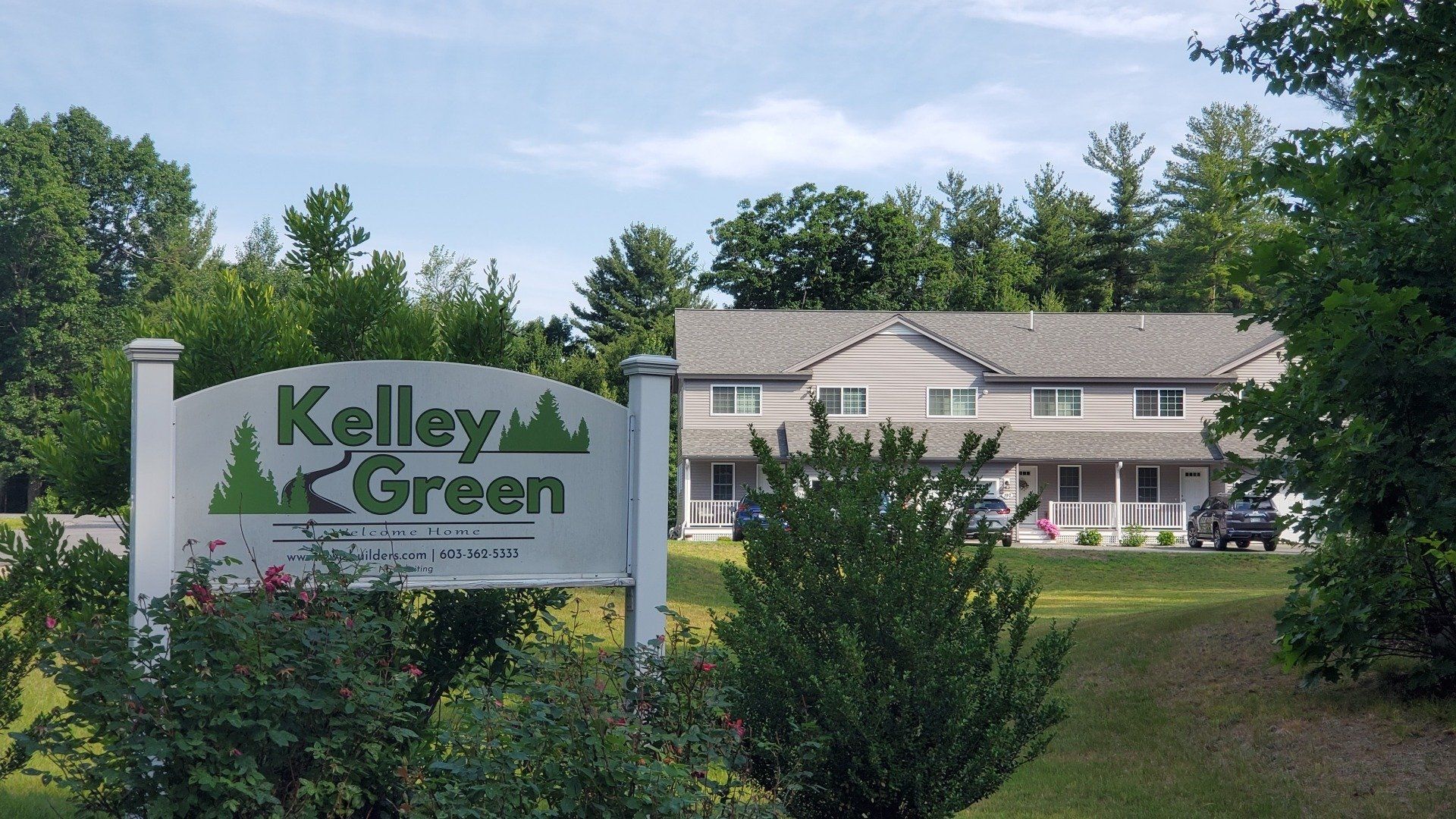 A kelly green sign in front of a house