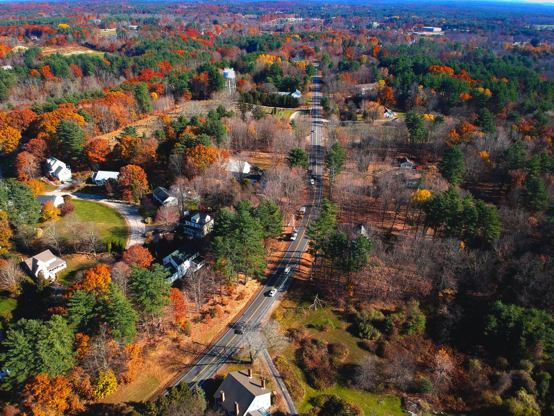 An aerial view of a residential area in the fall