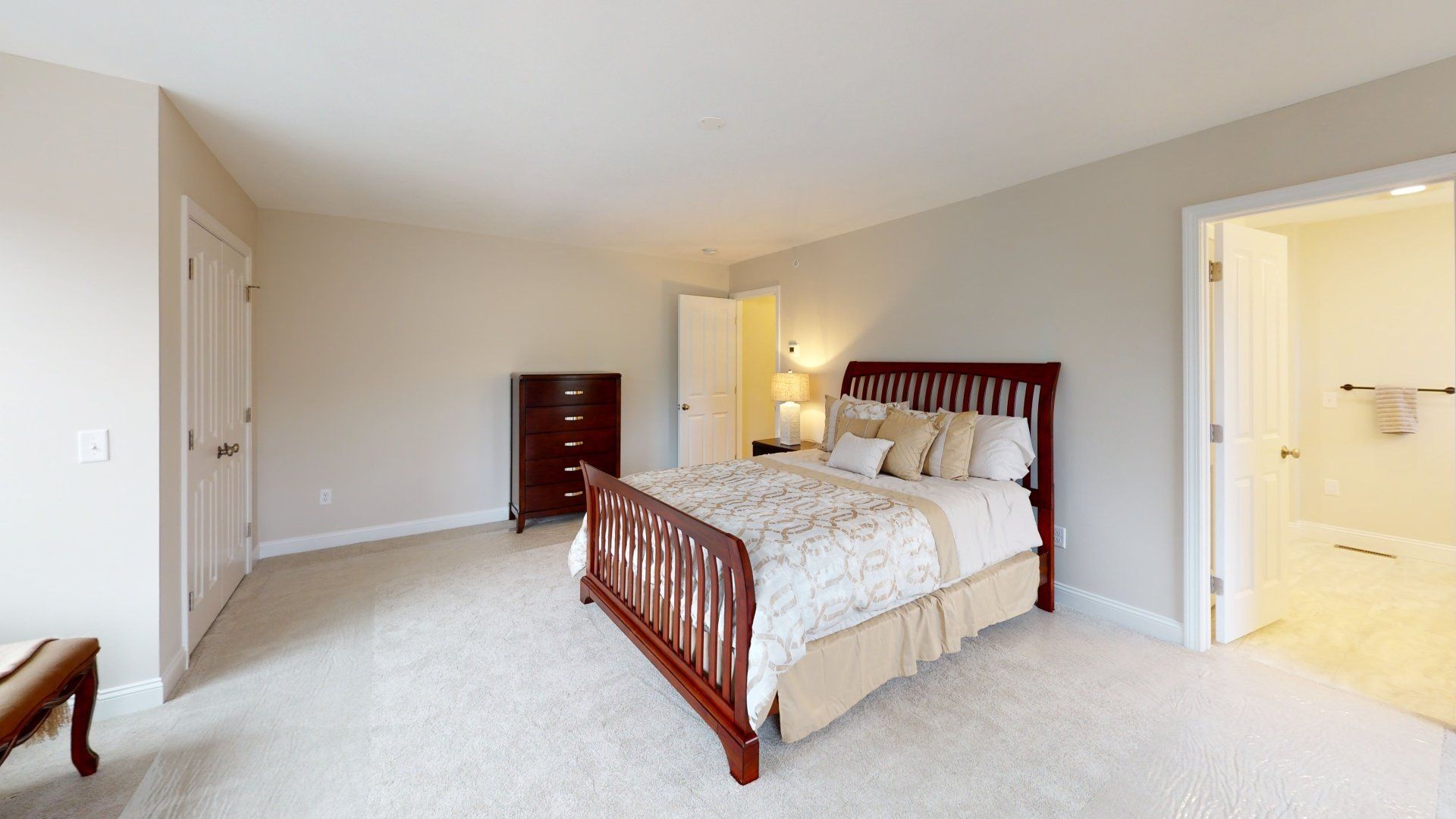 There is a large bed in the middle of the room.
