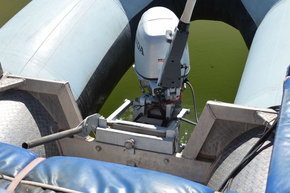 A boat with a honda outboard motor attached to it