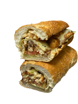 Two sandwiches are stacked on top of each other on a white background.