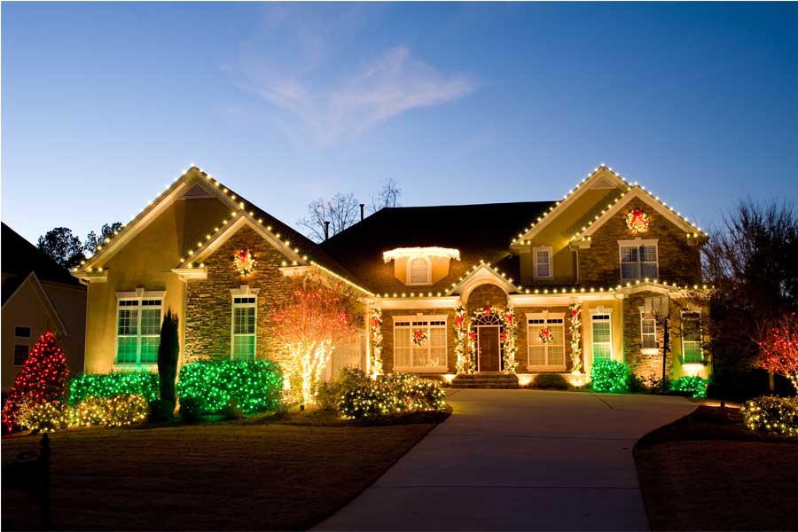 A large house with christmas lights on it