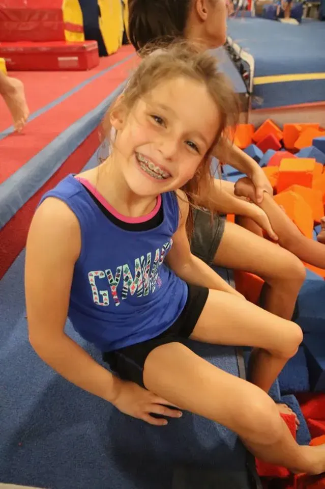 young gymnast smiling