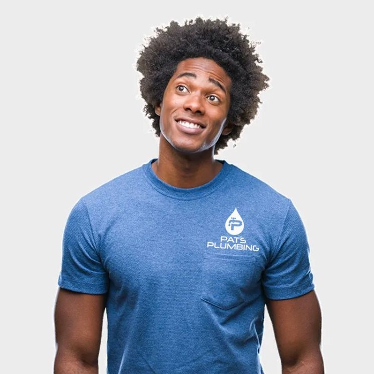 Man with afro wearing blue