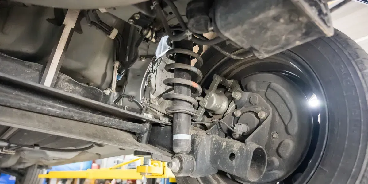 A Undercarriage of A Car Showing Suspension — Geelong Car Repair Centre in Newcomb, VIC