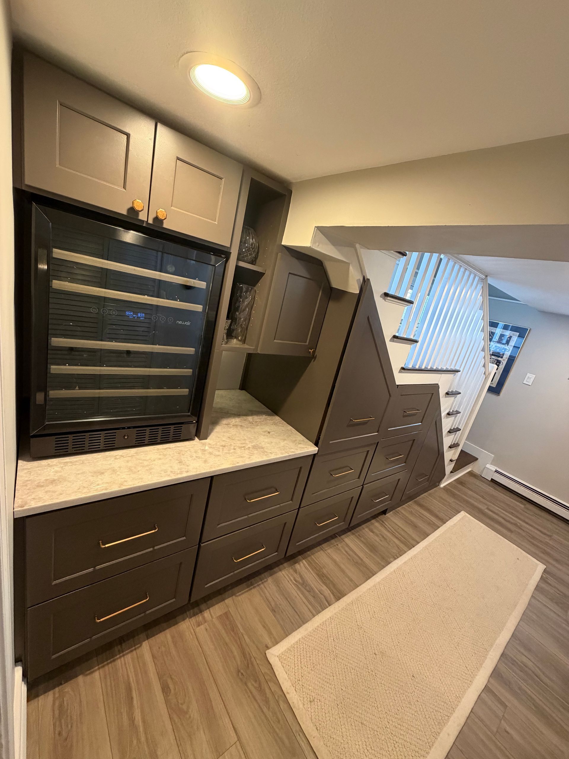After: Finished custom cabinetry with wine fridge casement and deep drawers in Winthrop MA
