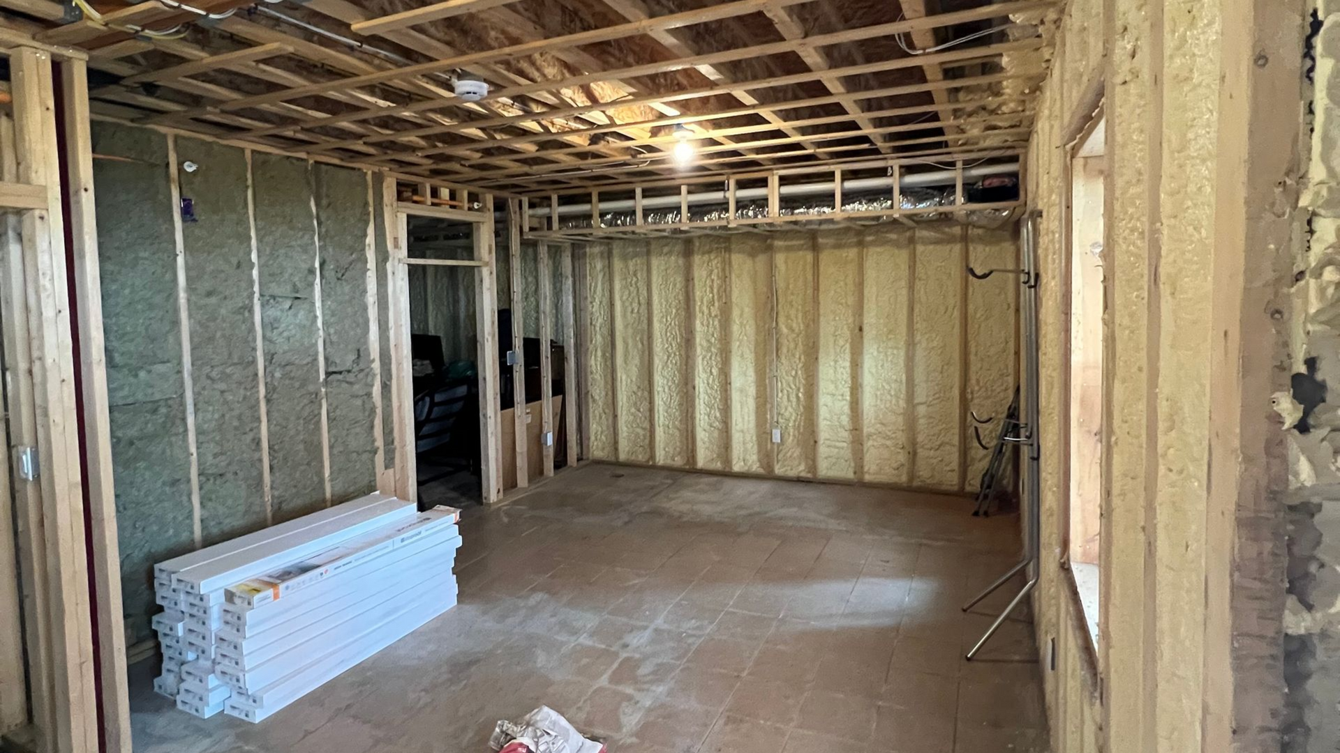 boston basement remodeling with studs and foam insulation