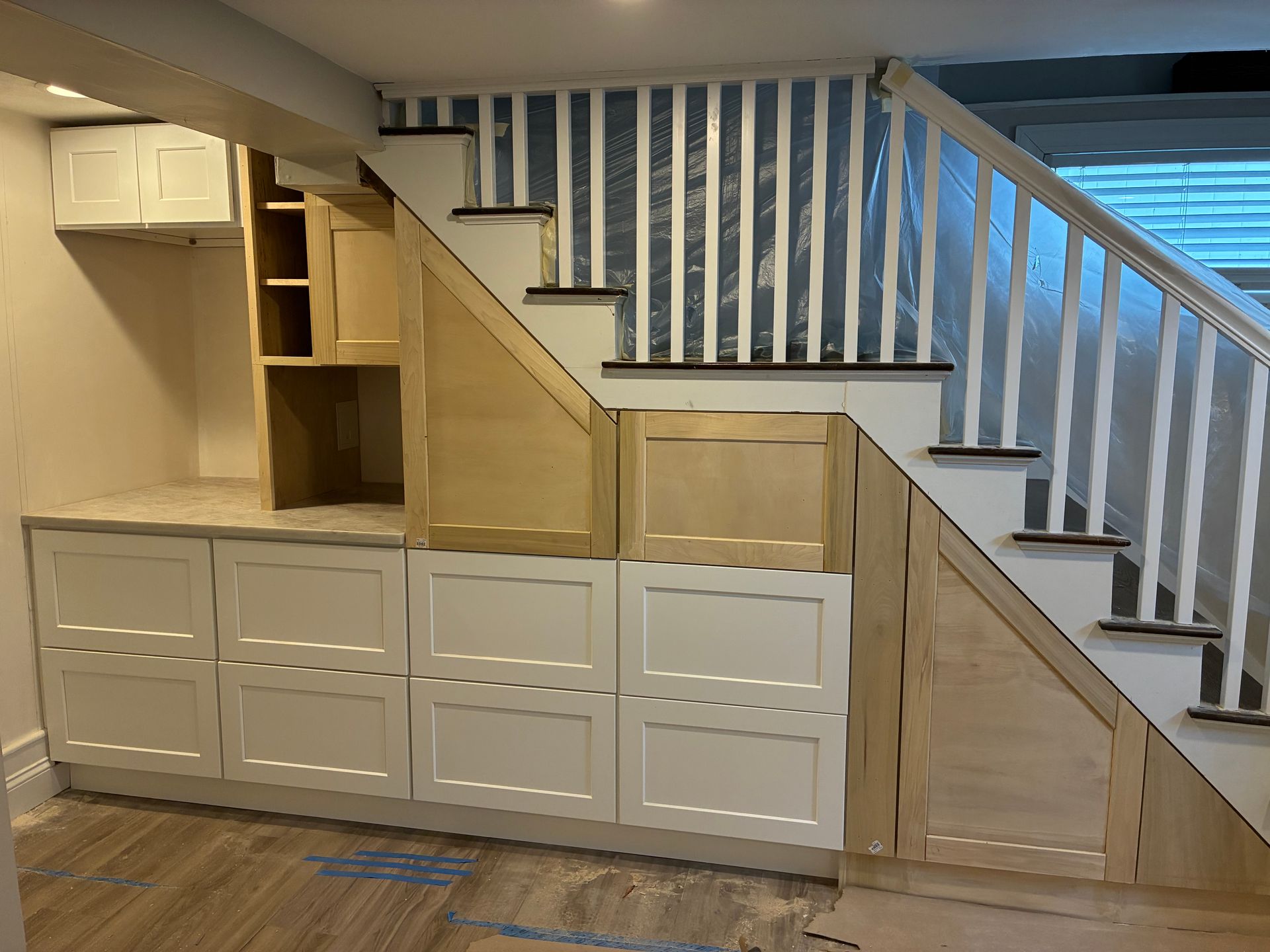 photo of custom cabinetry built under stairs