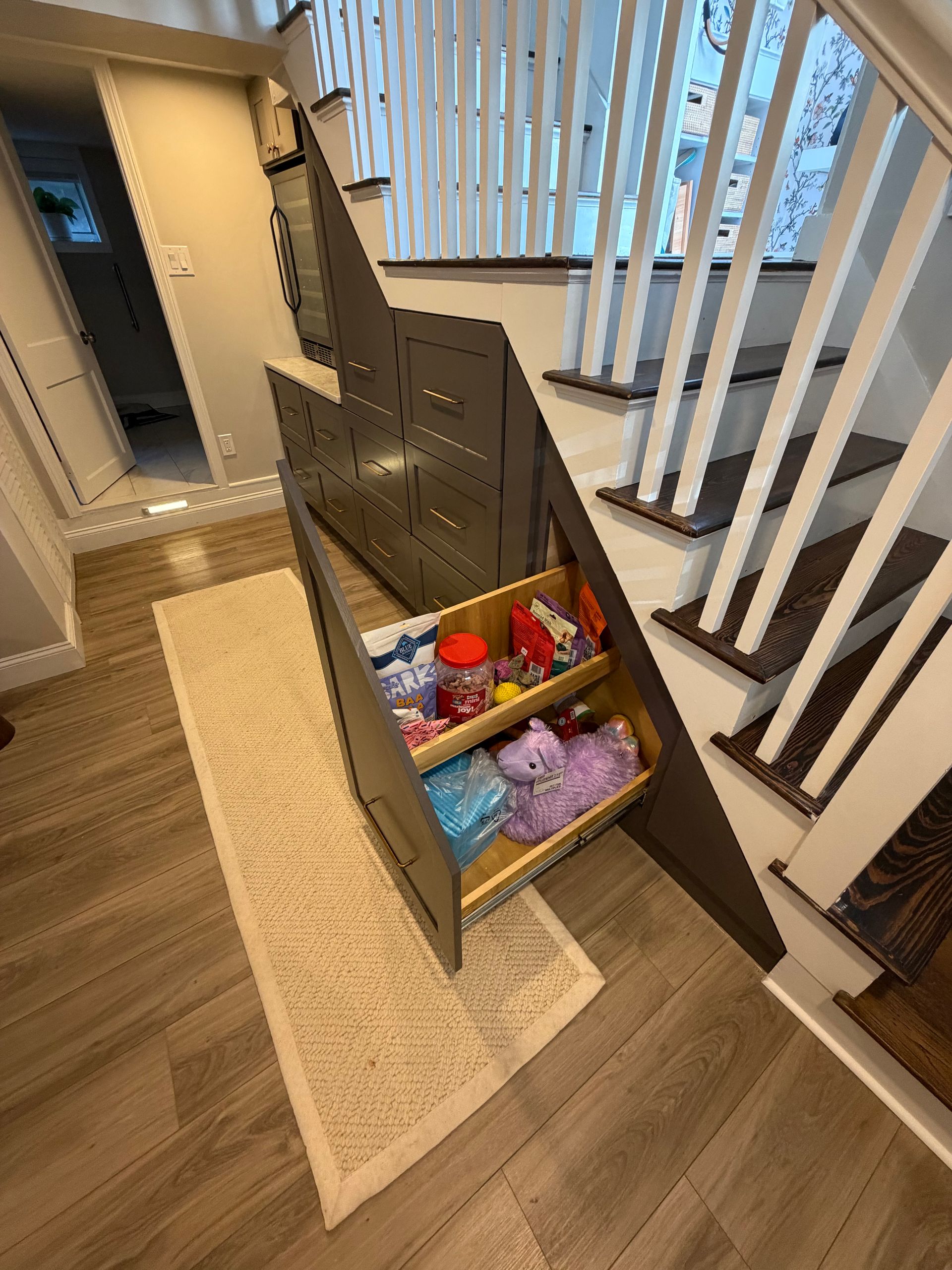 After: Finished custom cabinetry with wine fridge casement and deep drawers in Winthrop MA