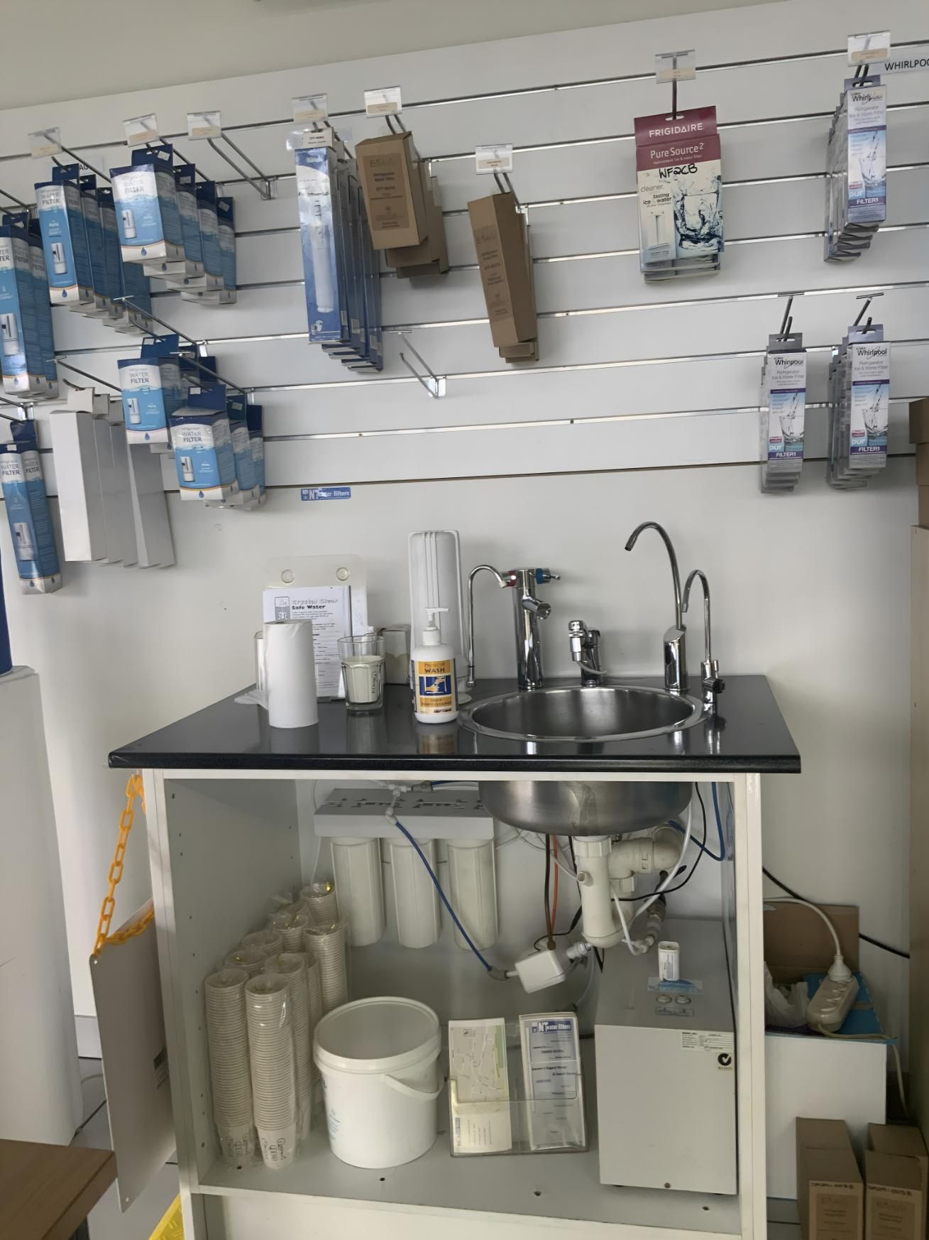 A Sink is Sitting Under a Cabinet in a Store — NT Water Filters In Winnellie, NT