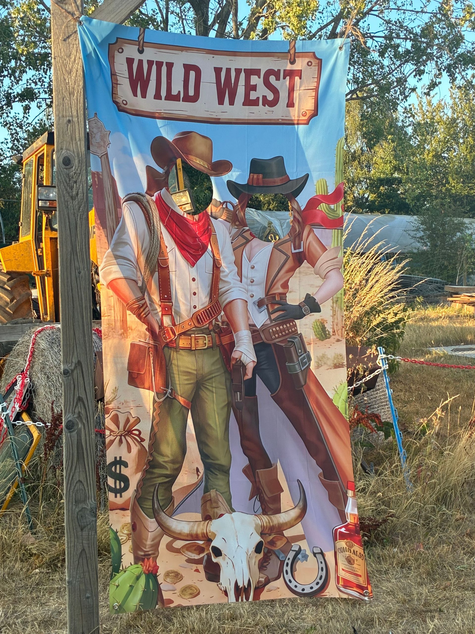 A Wild West themed photo board at a group party at The Apple Farm, Snitterfield — themed birthday and celebration getaways in Warwickshire
