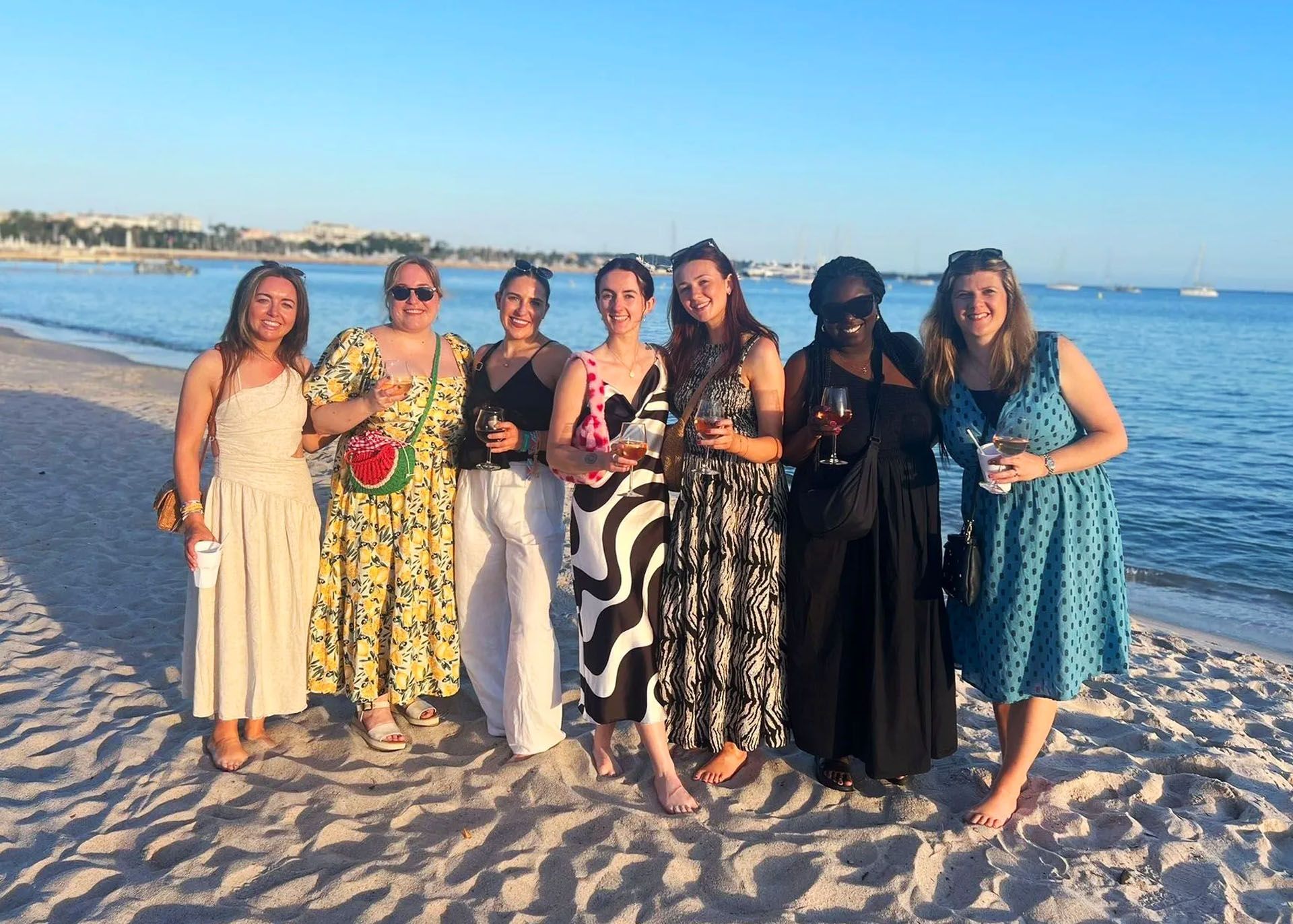 The Cannes ground team on the beach in the sun